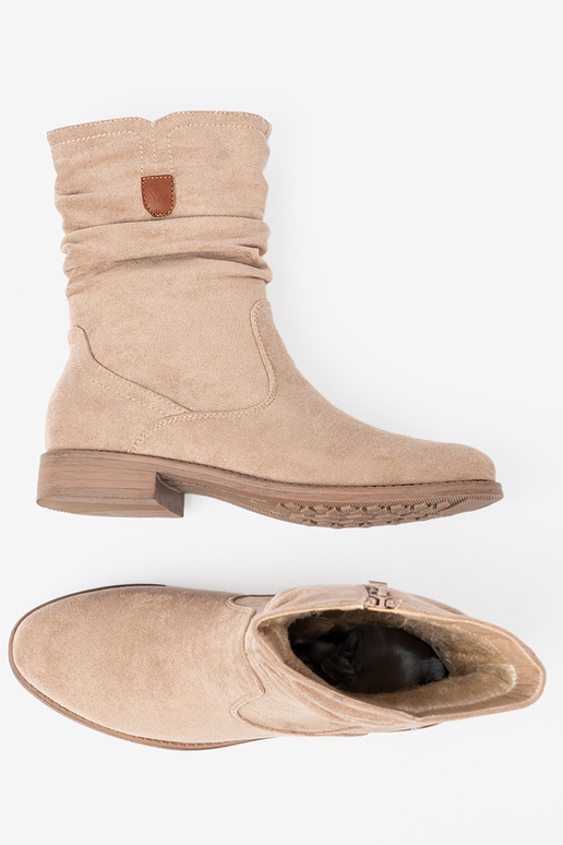 beige boots Inith a ruffled upper