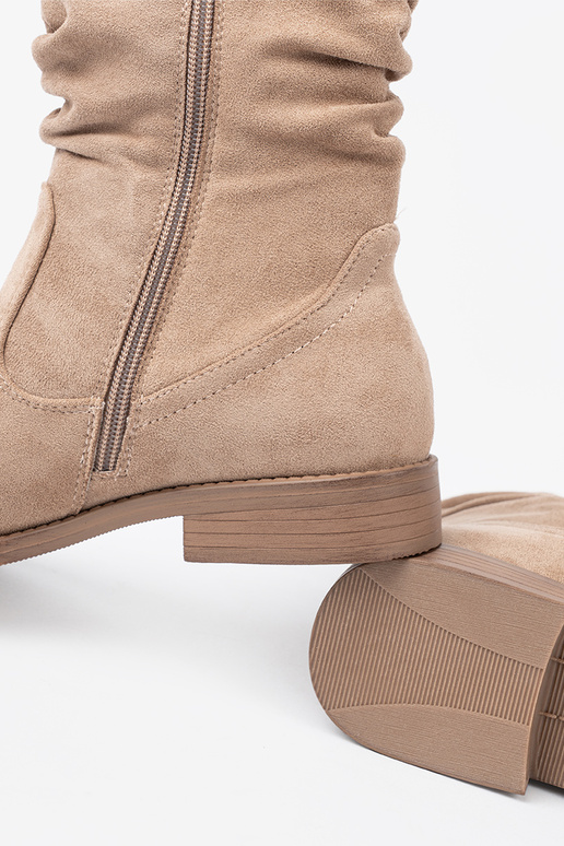 beige boots Inith a ruffled upper