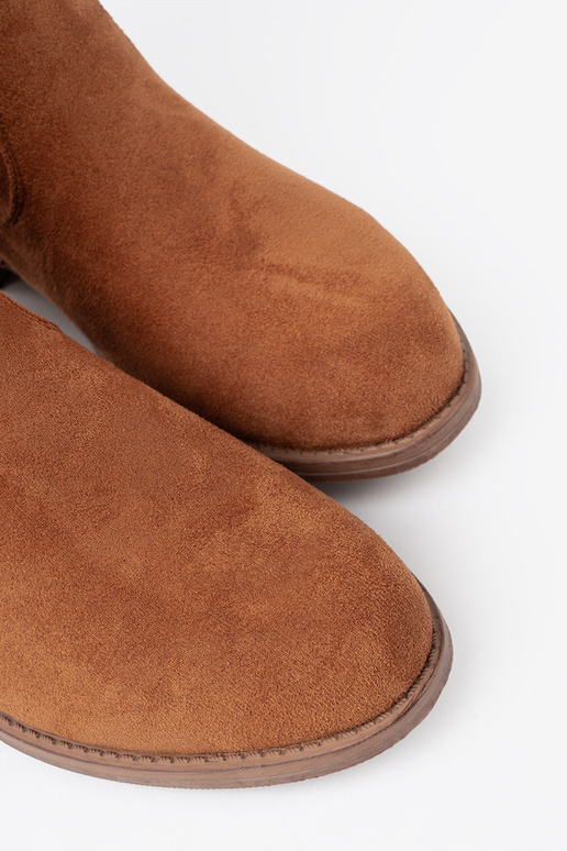 caramel colors boots Inith a ruffled upper