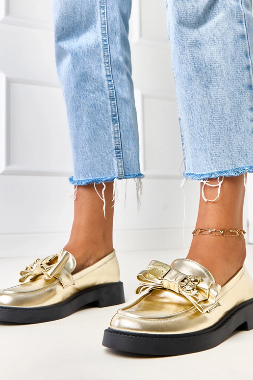 Złote mokasyny z kokardką i misiem...