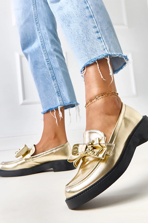 Złote mokasyny z kokardką i misiem...