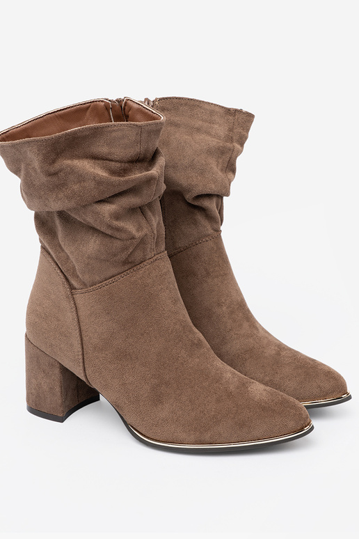 beige boots of suede on the heel