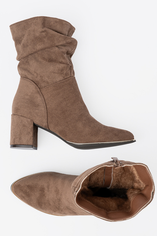 beige boots of suede on the heel