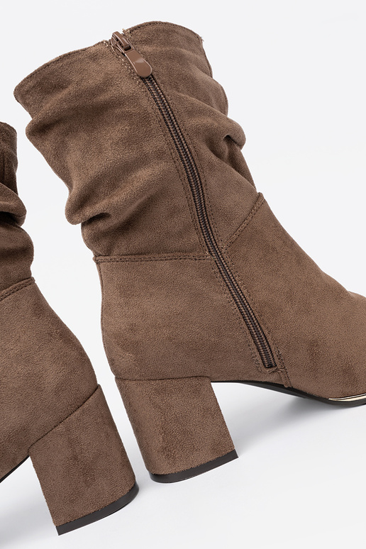 beige boots of suede on the heel
