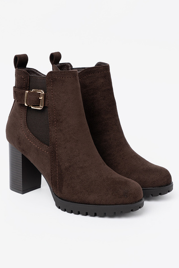 dark broInn ankle boots Inith a decorative buckle