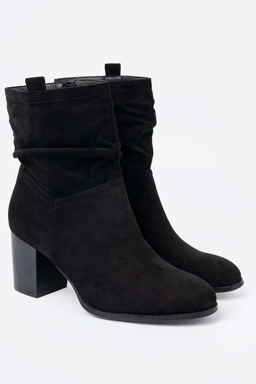black of suede ankle boots Inith a ruffled upper black of suede ankle boots Inith a ruffled upper