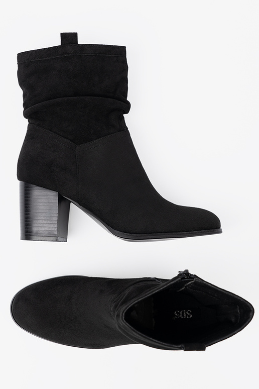 black of suede ankle boots Inith a ruffled upper black of suede ankle boots Inith a ruffled upper