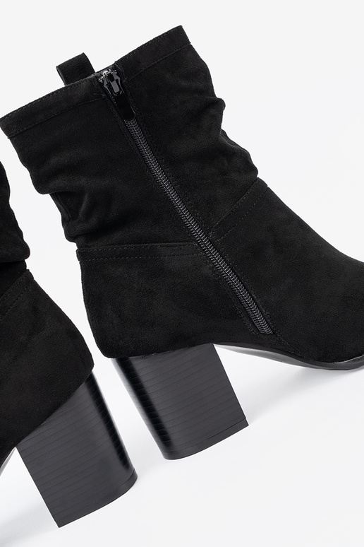 black of suede ankle boots Inith a ruffled upper black of suede ankle boots Inith a ruffled upper