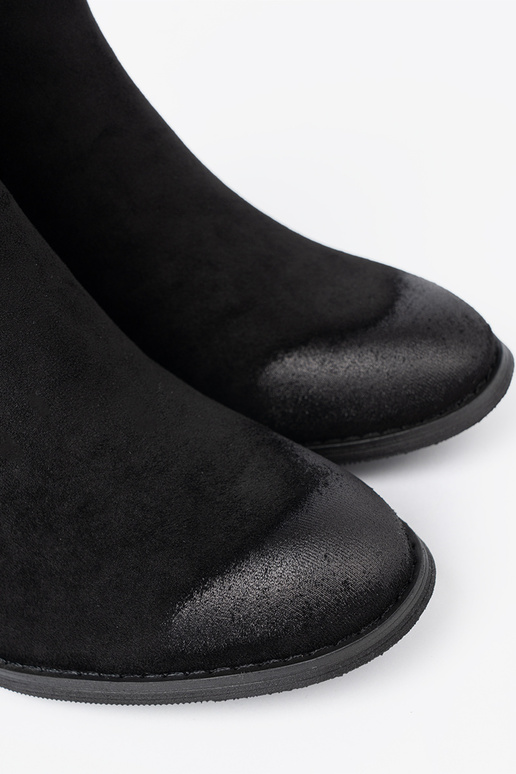 black of suede boots on a high pole insulated