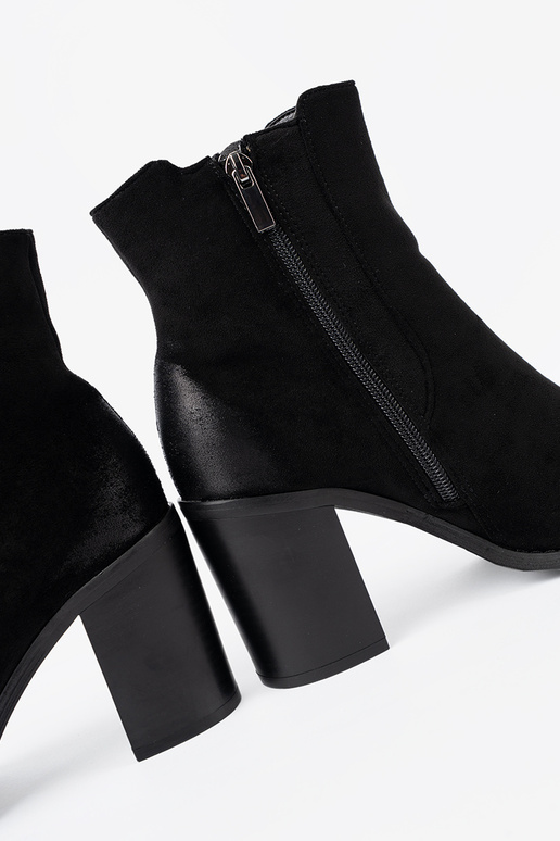 black of suede boots on a high pole insulated