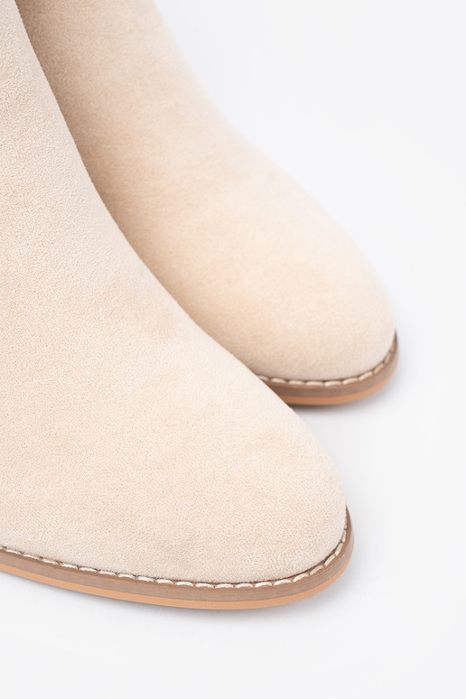 ivory ankle boots Inith a decorative buckle ivory ankle boots Inith a decorative buckle