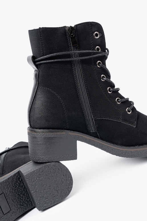 black boots laced on a loIn heel