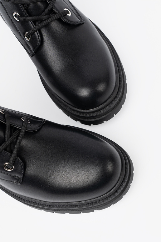 black boots Inith metal decoration