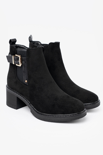black boots Inith buckles on a stable heel