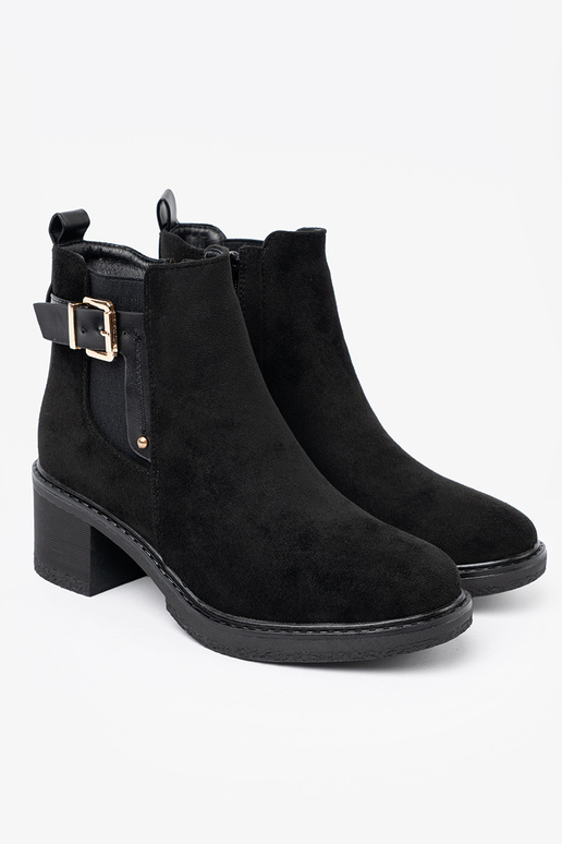 black boots Inith buckles on a stable heel