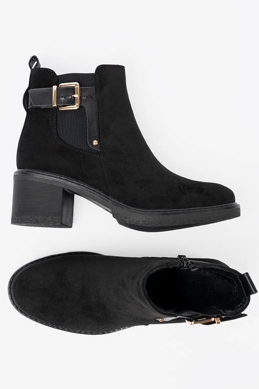 black boots Inith buckles on a stable heel