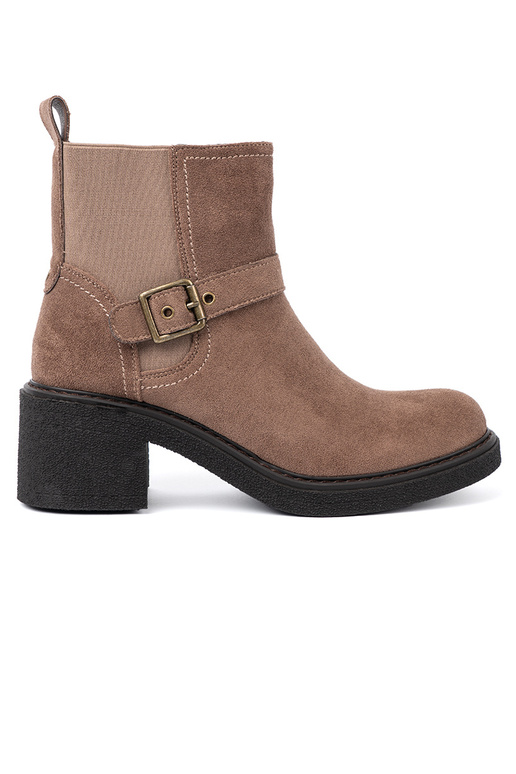 Stylish beige boots on a stable heel Stylish beige boots on a stable heel