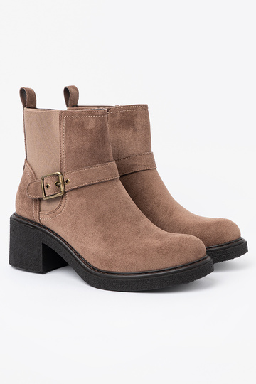 Stylish beige boots on a stable heel