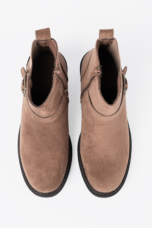 Stylish beige boots on a stable heel Stylish beige boots on a stable heel