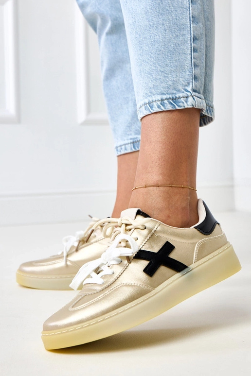 Złote sneakersy na platformie z...