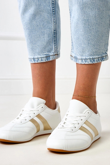 Białe sneakersy typu...
