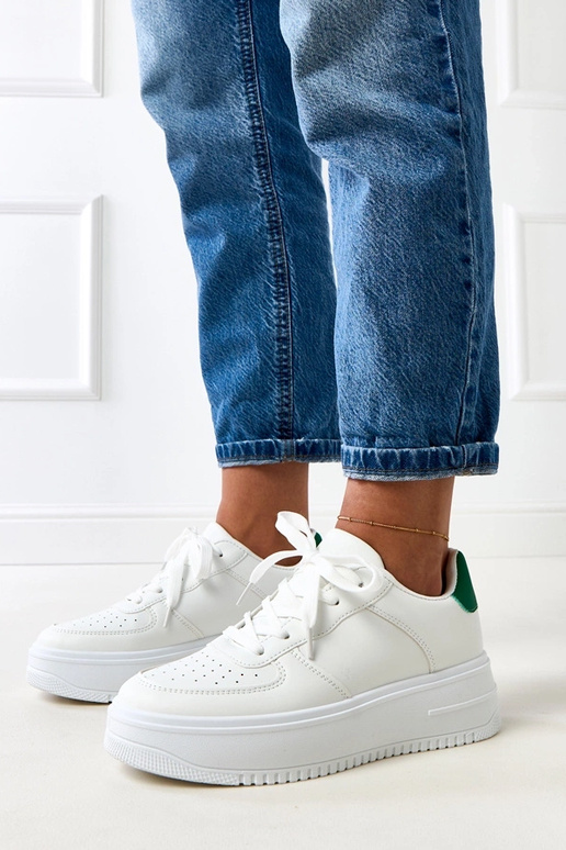 Białe sneakersy na platformie z... Białe sneakersy na platformie z...