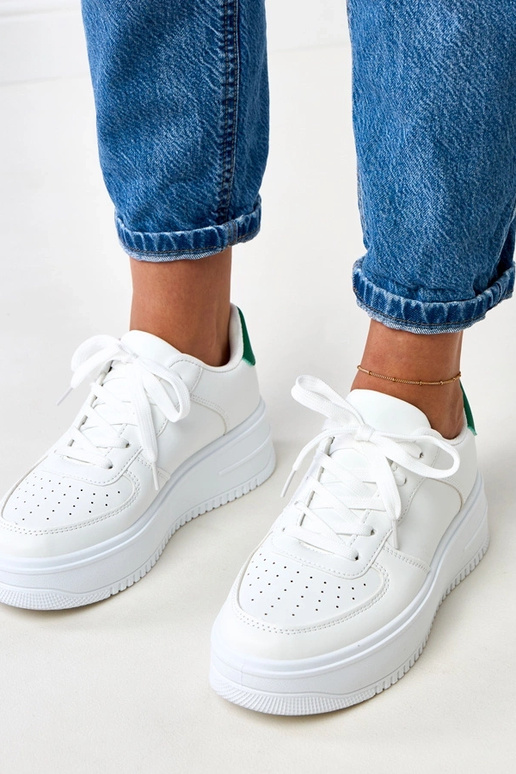 Białe sneakersy na platformie z... Białe sneakersy na platformie z...