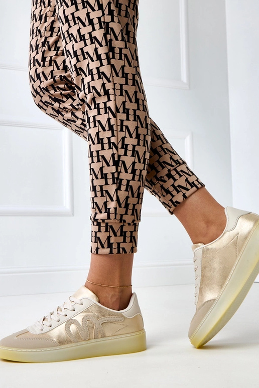 Beżowe sneakersy na platformie ze... Beżowe sneakersy na platformie ze...