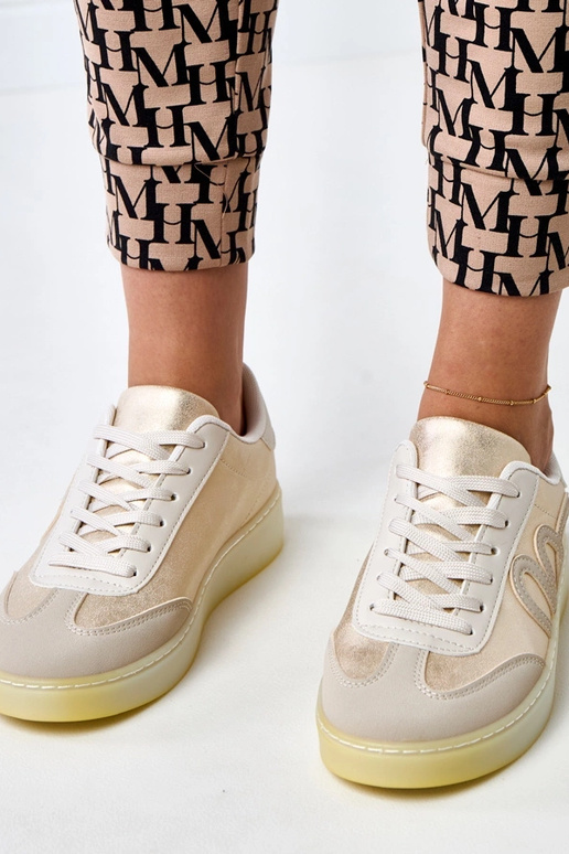 Beżowe sneakersy na platformie ze... Beżowe sneakersy na platformie ze...