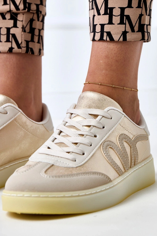 Beżowe sneakersy na platformie ze... Beżowe sneakersy na platformie ze...