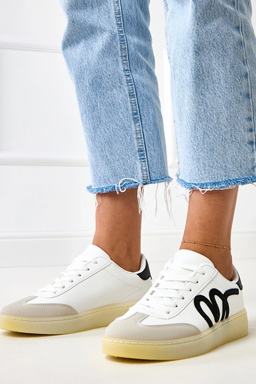 Białe sneakersy na...