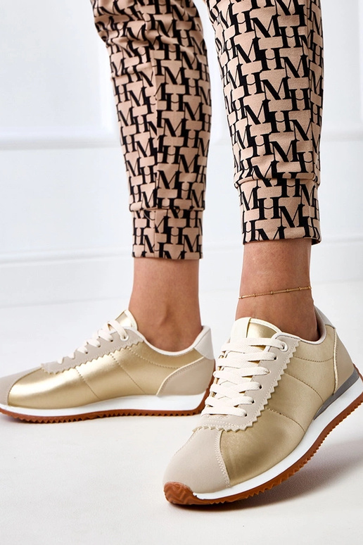 Beżowe sneakersy sportowe z beżową... Beżowe sneakersy sportowe z beżową...