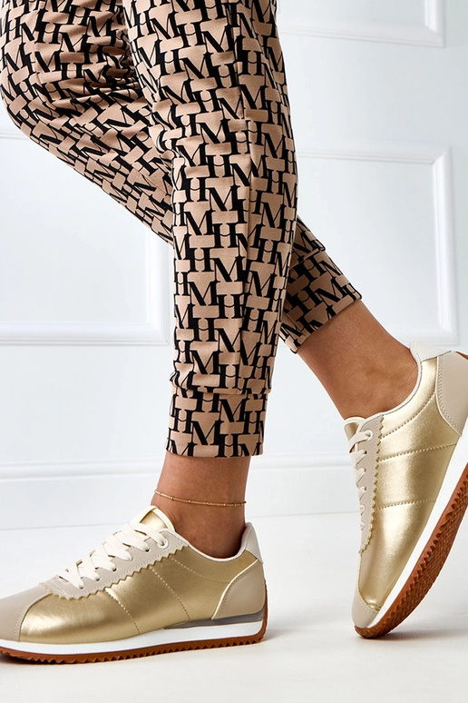 Beżowe sneakersy sportowe z beżową... Beżowe sneakersy sportowe z beżową...