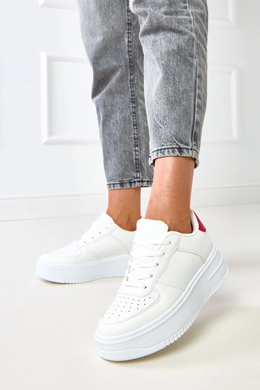 Białe sneakersy na platformie z... Białe sneakersy na platformie z...