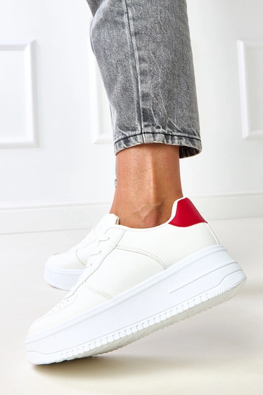 Białe sneakersy na platformie z... Białe sneakersy na platformie z...