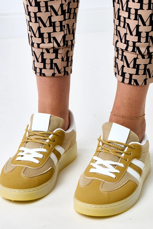 Żółte sneakersy siateczkowe z białą... Żółte sneakersy siateczkowe z białą...