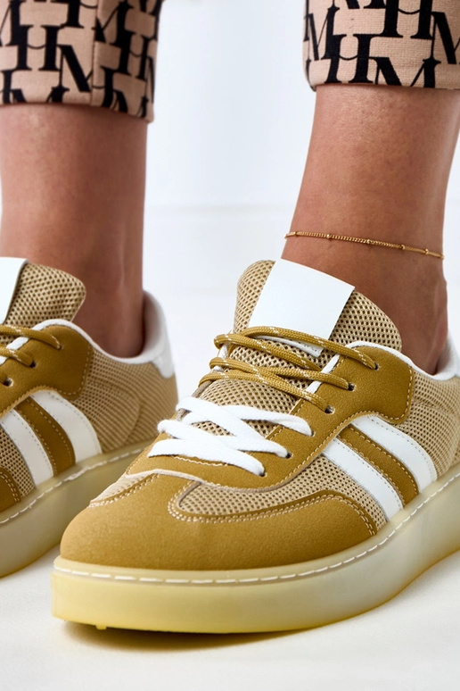 Żółte sneakersy siateczkowe z białą... Żółte sneakersy siateczkowe z białą...