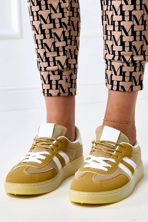 Żółte sneakersy siateczkowe z białą... Żółte sneakersy siateczkowe z białą...