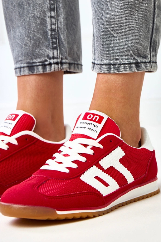 Czerwone sneakersy sportowe z białymi... Czerwone sneakersy sportowe z białymi...