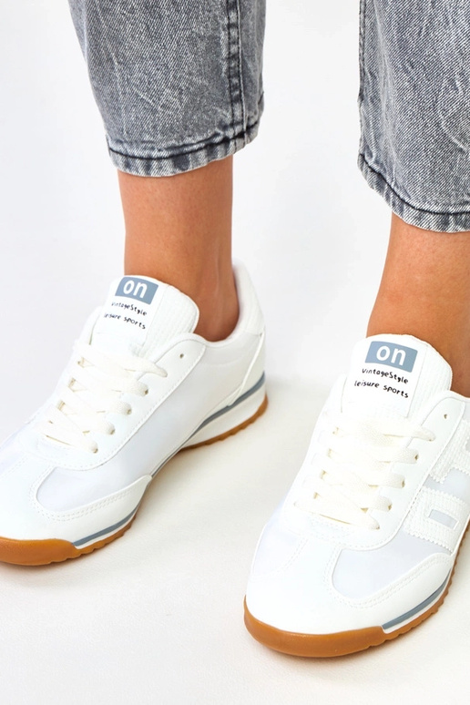 Białe sneakersy sportowe z szarymi... Białe sneakersy sportowe z szarymi...