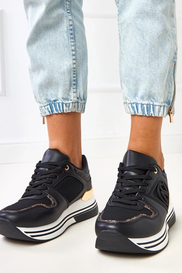 Czarne sneakersy na...