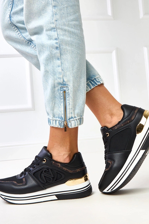 Czarne sneakersy na platformie ze...