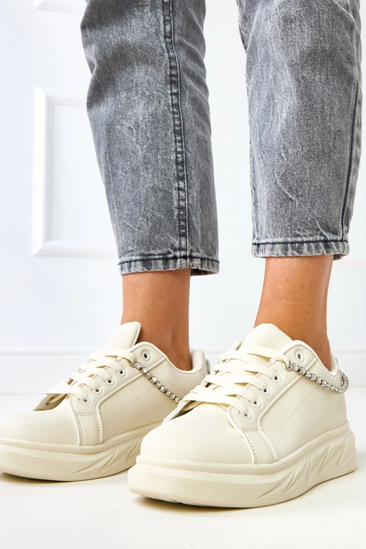 Beżowe sneakersy na platformie z... Beżowe sneakersy na platformie z...