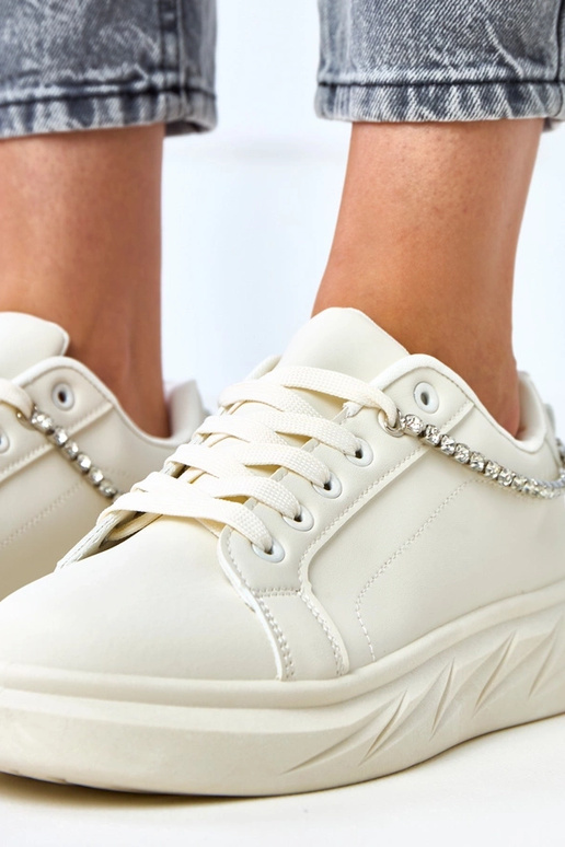 Beżowe sneakersy na platformie z... Beżowe sneakersy na platformie z...