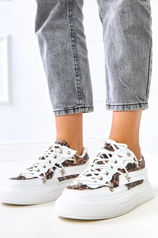 Białe sneakersy na platformie z... Białe sneakersy na platformie z...