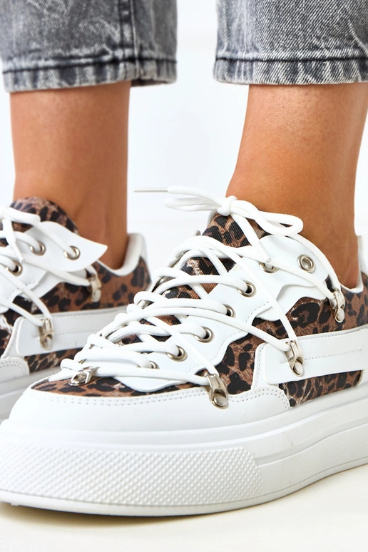 Białe sneakersy na platformie z... Białe sneakersy na platformie z...