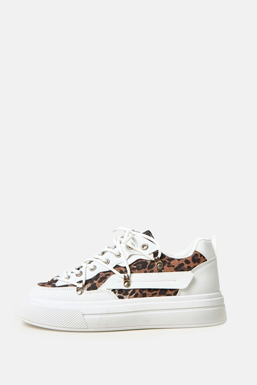 Białe sneakersy na platformie z... Białe sneakersy na platformie z...