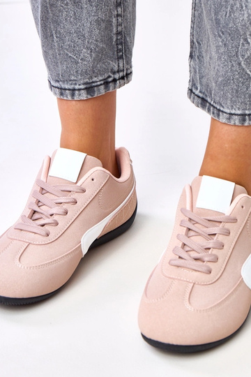 Różowe sneakersy z białym...