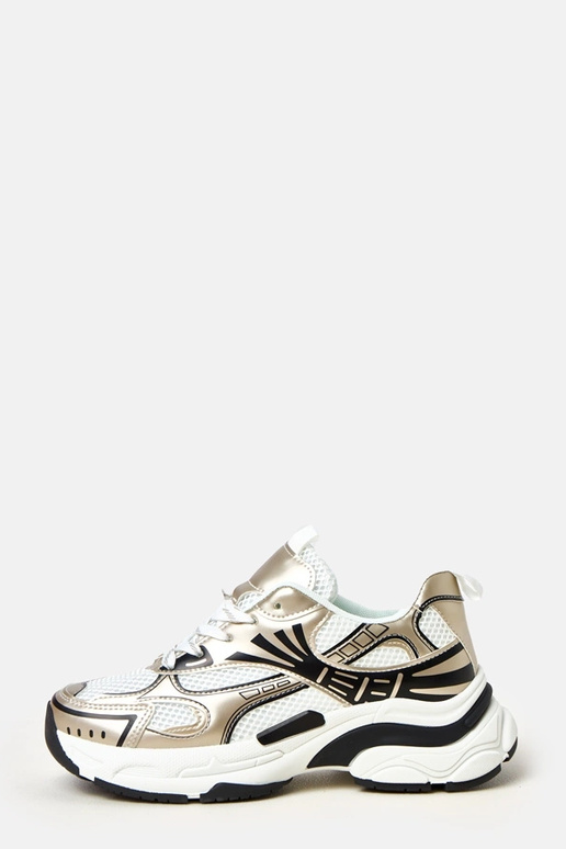 Złote sneakersy sportowe na masywnej... Złote sneakersy sportowe na masywnej...