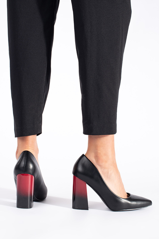 black High heels on a high pole